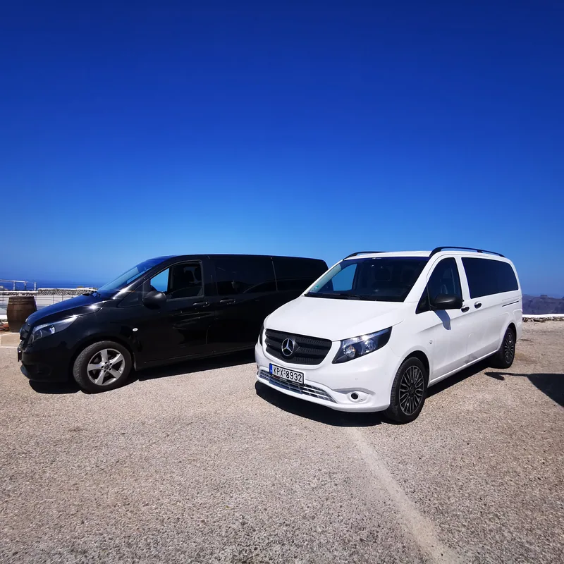 Both VH Transfer Mercedes Vito vans above the Santorini caldera